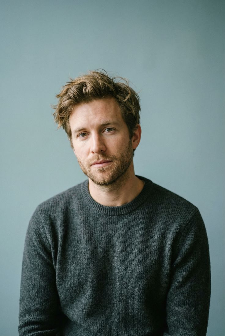 Portrait of Behfar Zamani wearing a dark sweater